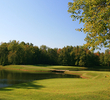 The fifth hole at Winding Hollow is a par 3 guarded by water in front and to the right. 