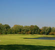The seventh hole at Winding Hollow is more wide open but features water down the right side of the fairway. 