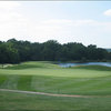 A view of the 5th green with water in background at Upper Lansdowne Golf Course